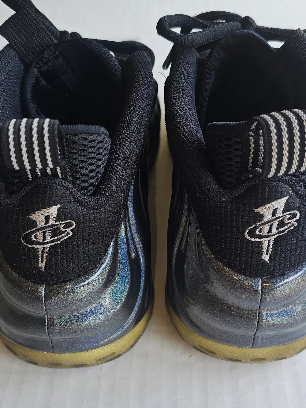 Nike Men's All-Black Iridescent Foamposite-Style Sneakers